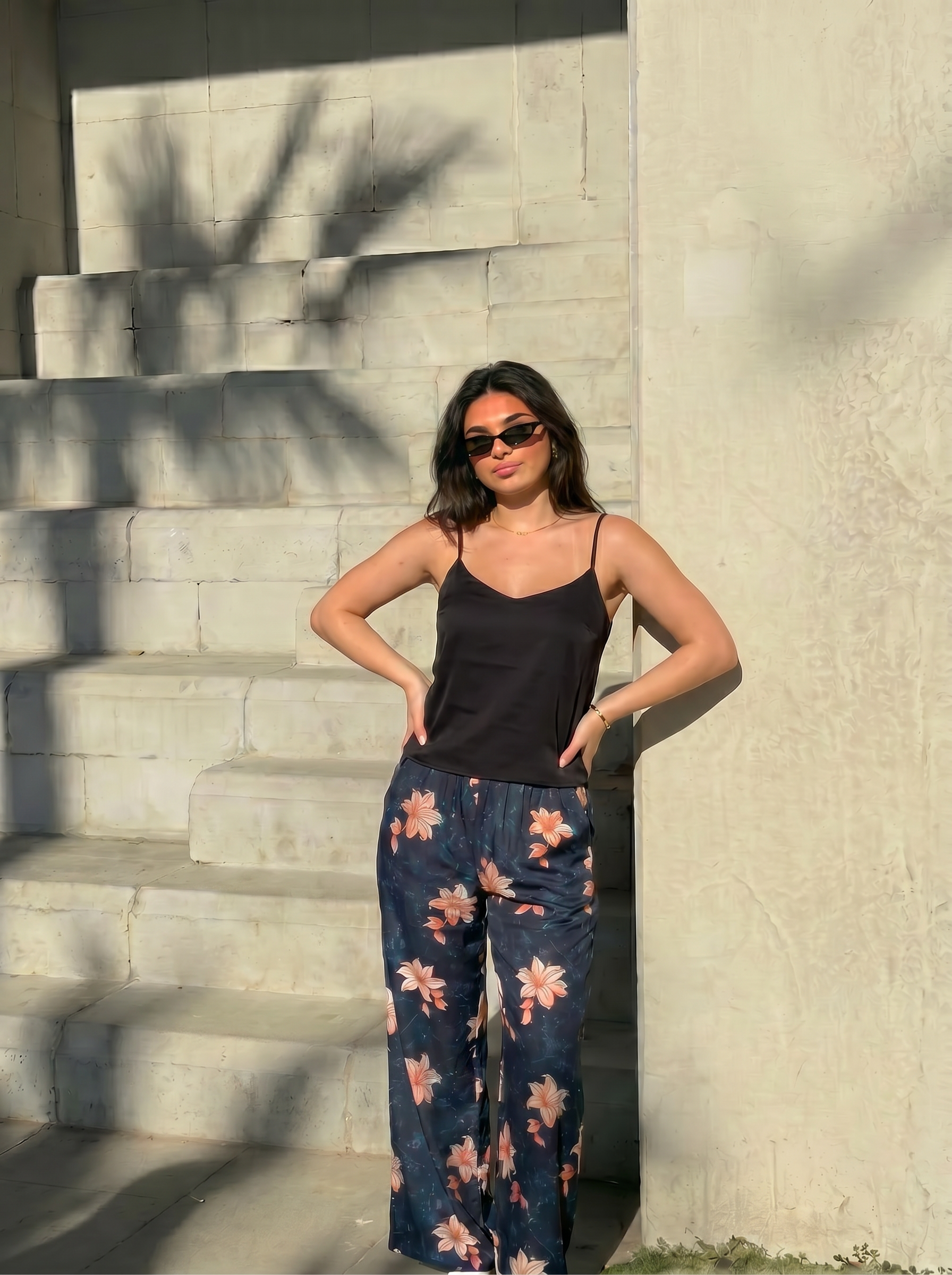 Black cut top with beige pistachio pants